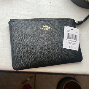 New, never been used coach wristlet